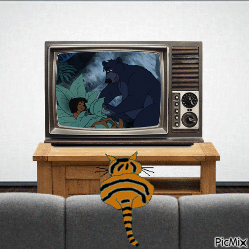 Cat watching The Jungle Book - Free animated GIF