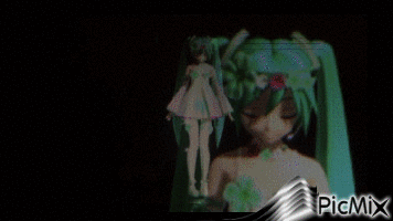 Miku Hatsune avec des pages animés - GIF animé gratuit