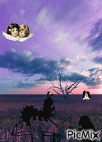 Siluetas en un paisaje violáceo animirani GIF