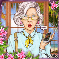 Eine alte Frau spricht am Telefon.