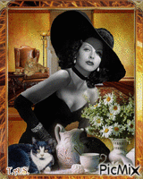 Lady whith black hat & her cat