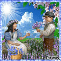Petit couple au printemps et fleurs violettes