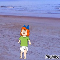 Redhead baby girl at beach GIF animé