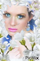 woman in blue/white lillies - Free animated GIF