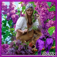 Jolie jeune fille avec des fleurs lilas. GIF animé