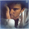 Concours : Portrait d'un homme triste sur fond bleu - GIF animé gratuit