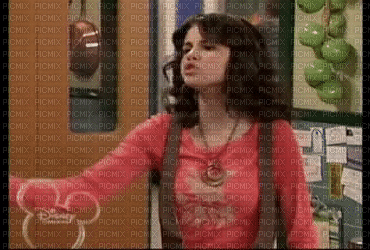 Alex Russo with Reddish-Pink Sweater - GIF animate gratis