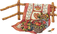 Country Charm Quilt Hanging on Log Fence